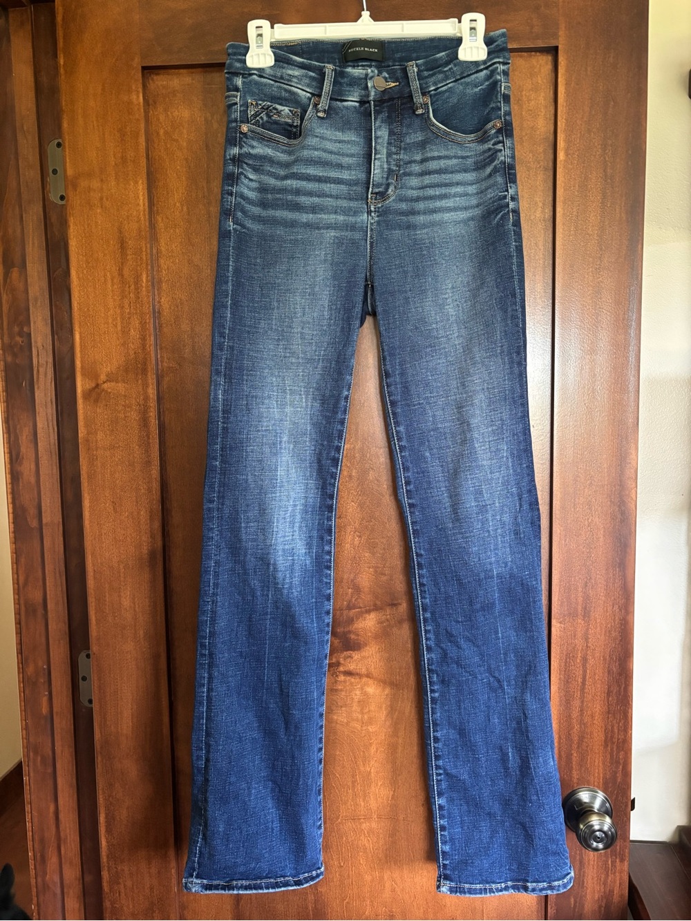 Buckle high rise bootcut jeans